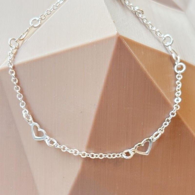 PULSEIRA CORAÇÕES VAZADOS CONT PRATA