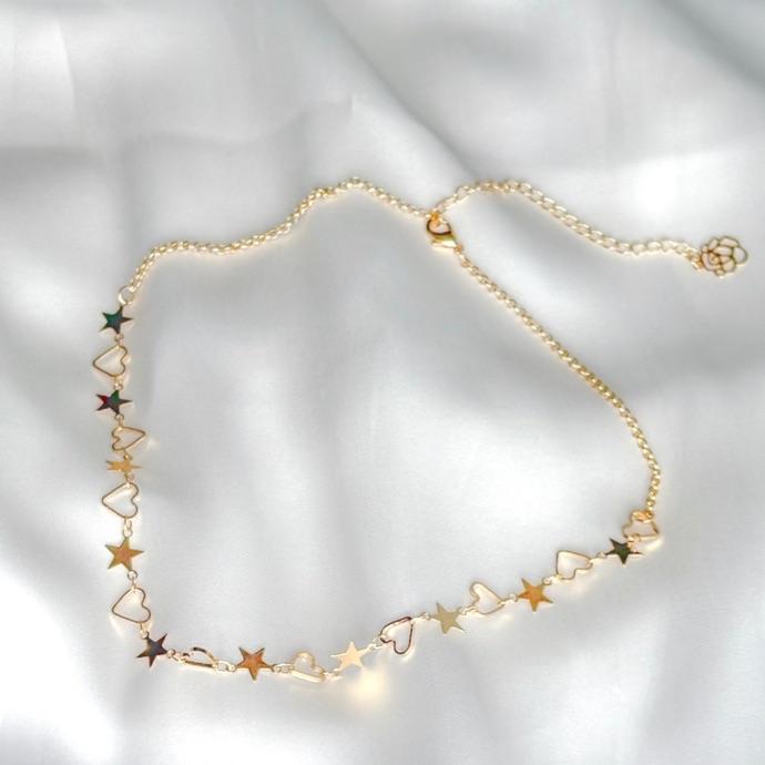 COLAR CHOKER ESTRELAS LISAS E CORAÇÕES VAZADOS CONT. B. OURO