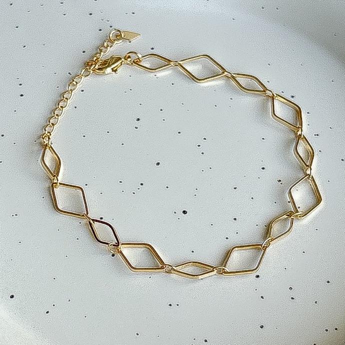 PULSEIRA LOSANGOS VAZADOS B. OURO