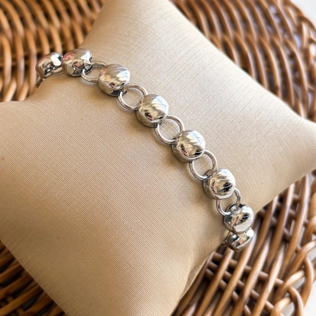 PULSEIRA AÇO CÍRCULOS PREENCHIDOS E VAZADOS