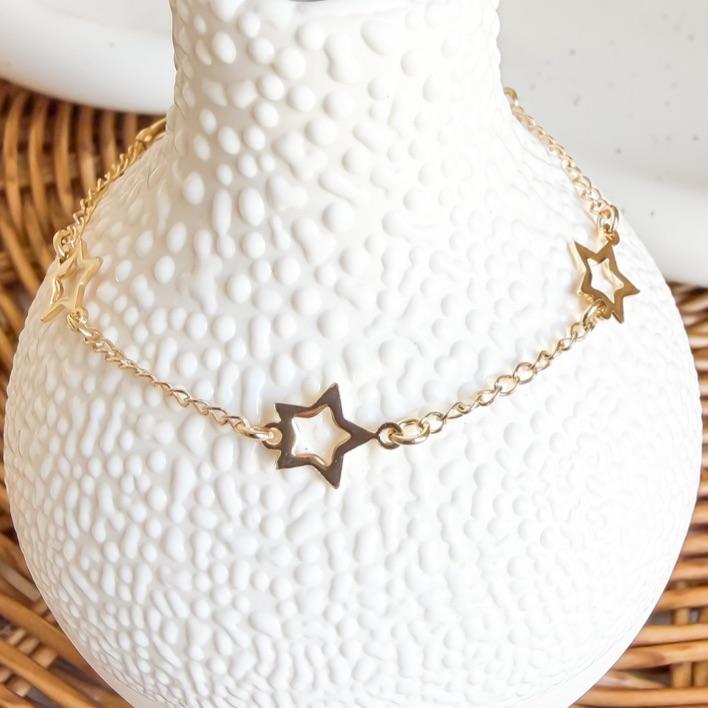 PULSEIRA ESTRELAS VAZADAS CONT B. OURO
